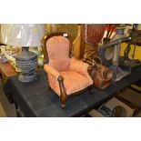 A Victorian style and upholstered doll's armchair