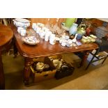 A Victorian mahogany extending dining table