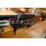 A late Victorian ebonised fold over card table