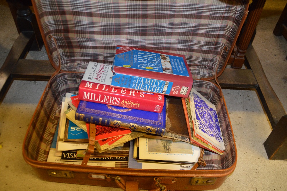 A suitcase of various books etc.