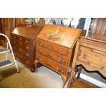 A walnut and chinoiserie decorated three drawer bu
