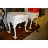 A pair of French style bedside tables, each fitted