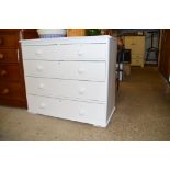 A white painted pine chest of two short over three