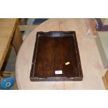 An oriental style hardwood tray