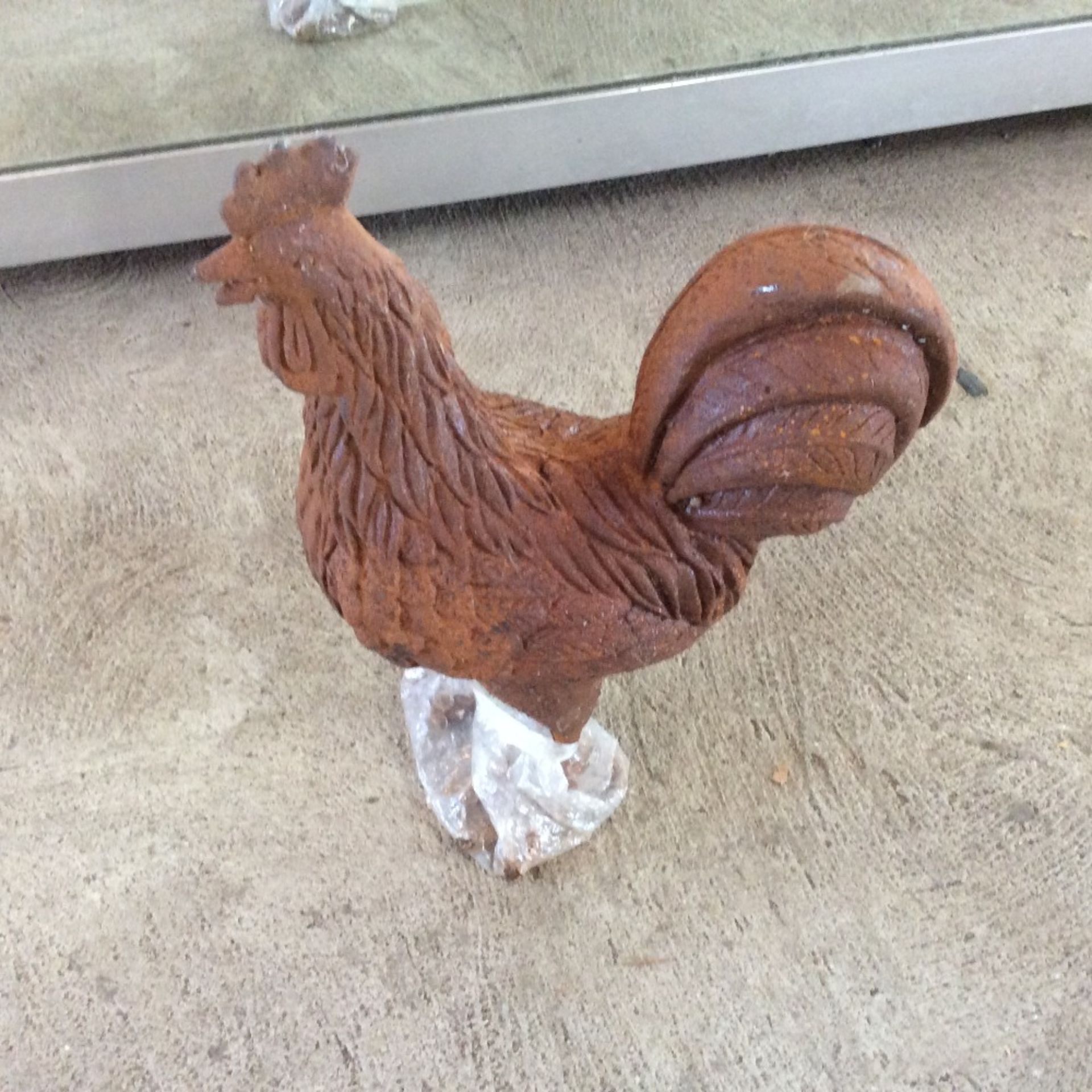 Cast iron rusty hen.