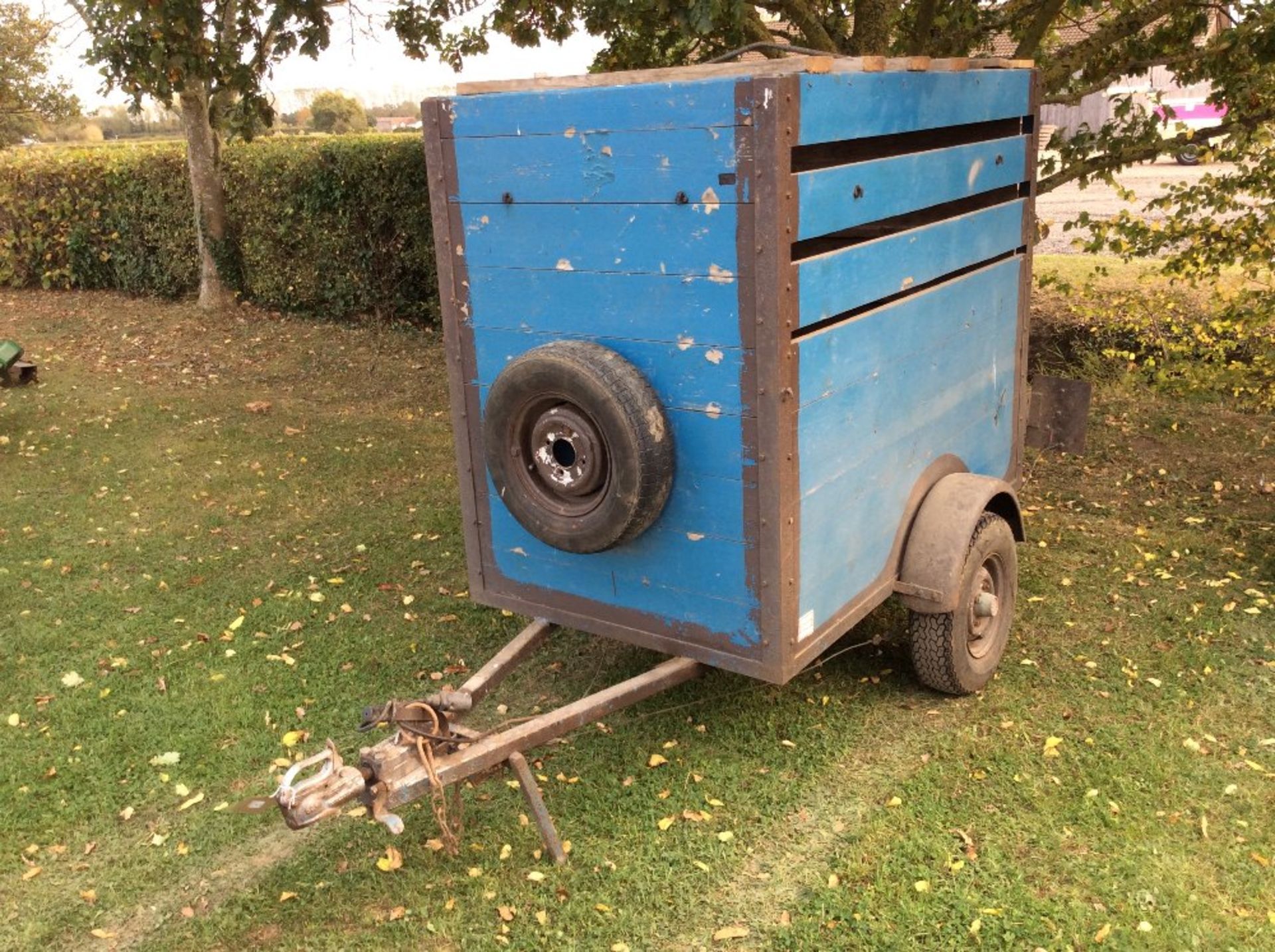 Small single axle livestock trailer.