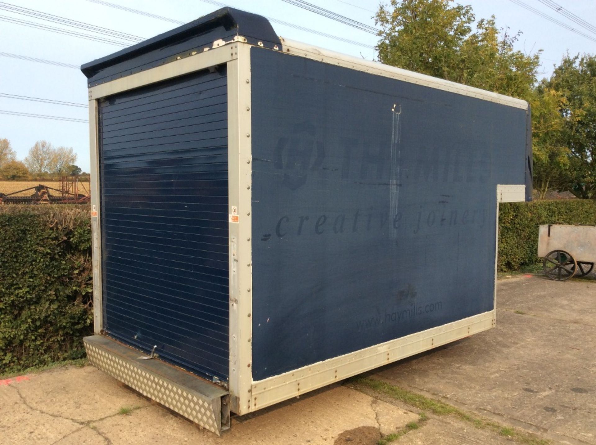 Luton body as removed from Transit van. With roller shutter door.