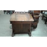 A Victorian mahogany Davenport writing desk with p