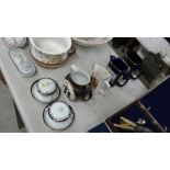 Four various brewery jugs; and two Minton bowls on