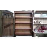A reproduction mahogany bookcase