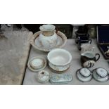 An Edwardian floral decorated wash set; and soap d