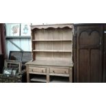 An oak kitchen dresser fitted two drawers