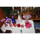 A collection of various coloured glassware to incl