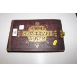 A postage stamp album containing early mint and us