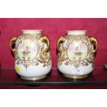 A pair of Nippon vases decorated with sailing boat