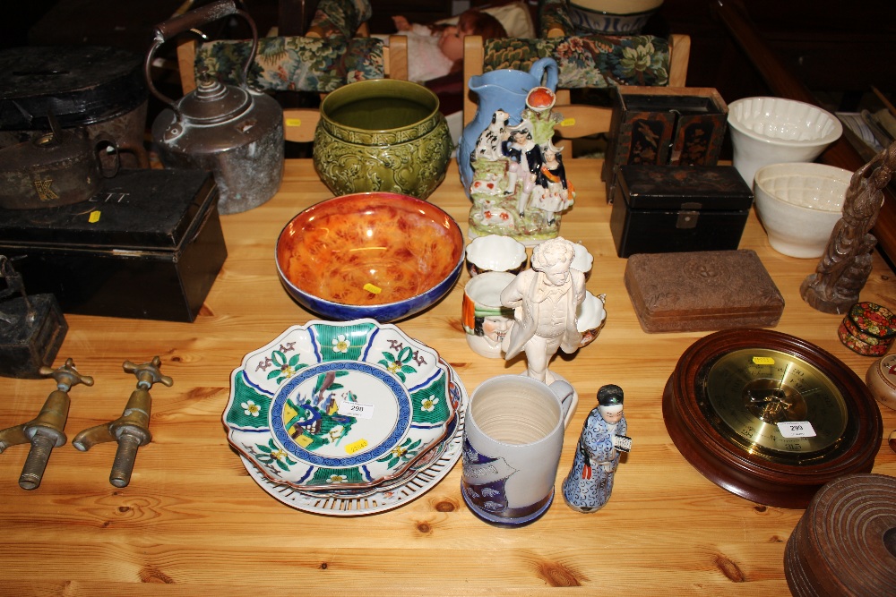 A blue lustre fruit bowl; a Staffordshire flat bac