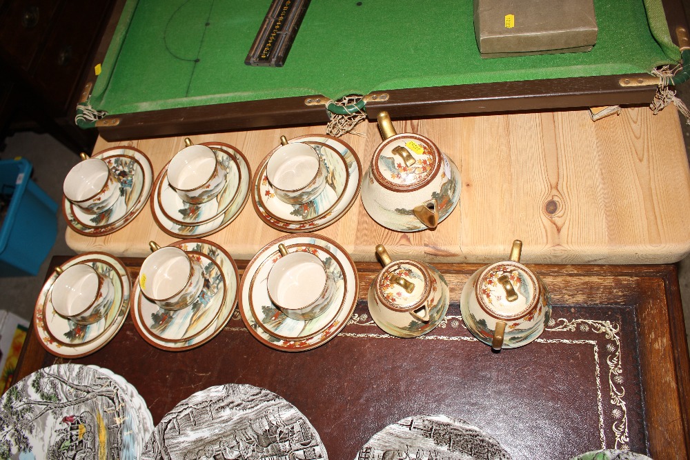 A Japanese figural decorated teaset