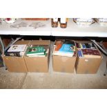 Four boxes of various books