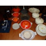 A set of eight pieces of Le Creuset enamel and cas