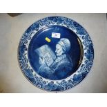 A Delft blue and white portrait plaque depicting R