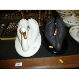 Two Franklin Mint swans