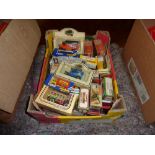 A box of die-cast model vehicles in original boxes