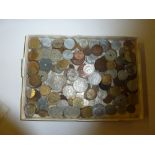 A tray of various foreign coinage