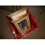 A box of various pictures and prints