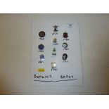 Ten Various Butlin badges on card, dating from the