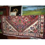 An approx. 3' x 5" x 5' 2" Eastern patterned rug