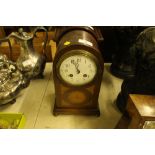 An Edwardian inlaid mahogany mantel clock with eig