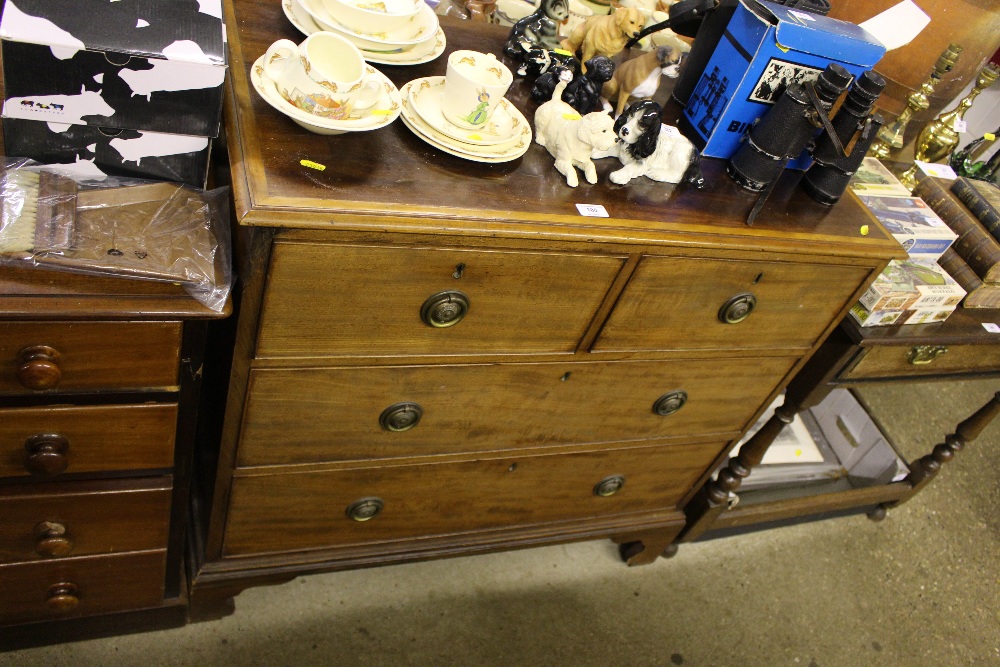 A mahogany and inlaid chest fitted two short over