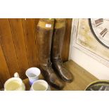 A pair of vintage leather riding boots complete wi
