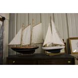 Two painted wooden model yachts