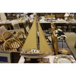 A wooden model yacht