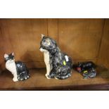 Four various cat ornaments