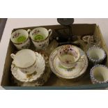 A tray of china saucers and coffee cups; a small s