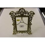 An ornate brass photo frame