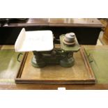 An oak twin handled drinks tray;and a set of scale