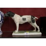 A large Rosethal china dog with original retail la