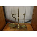 A set of Victorian brass shop scales with weights