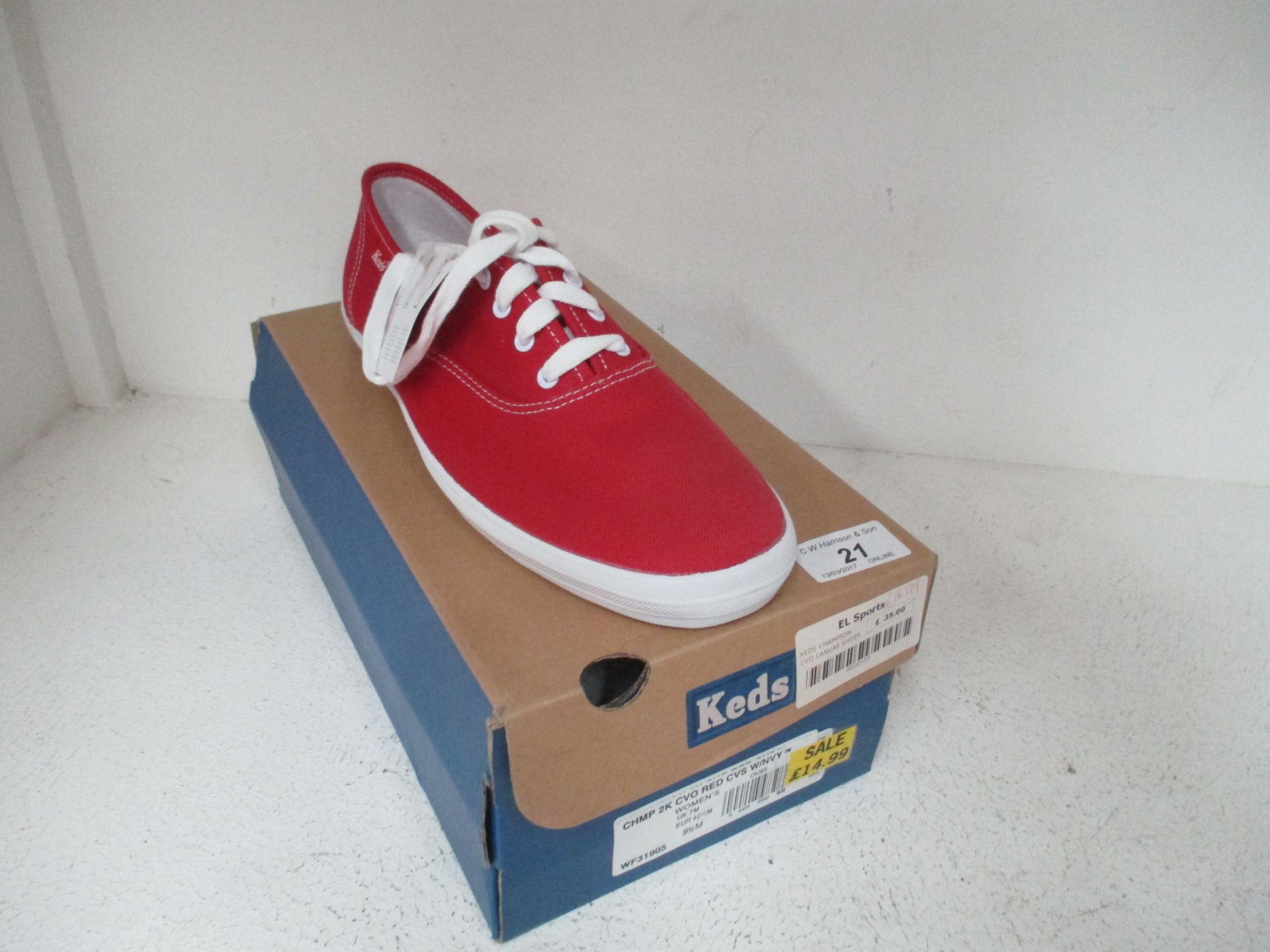 A pair of Keds Champion CVO ladies canvas shoes in red size UK 7