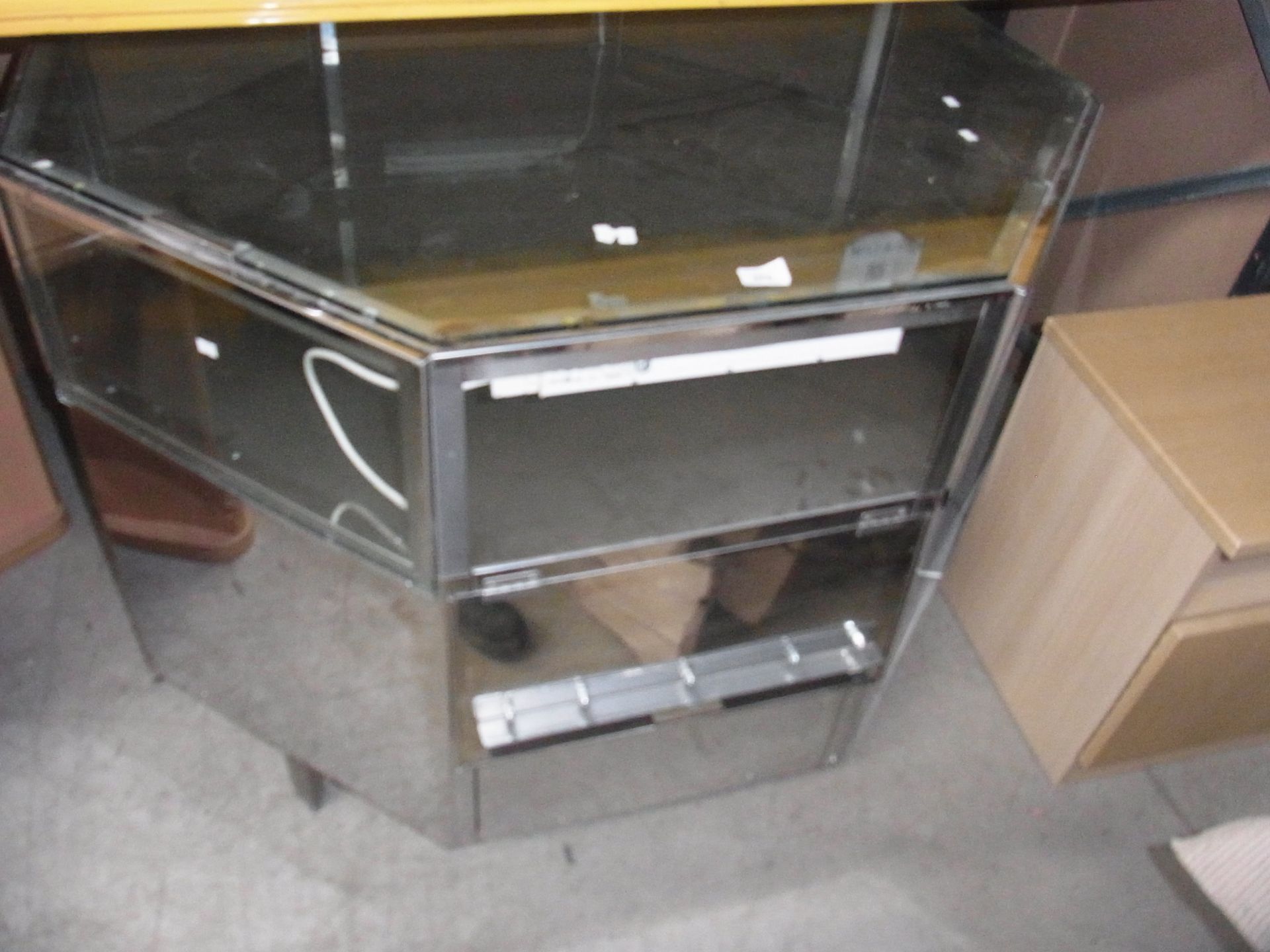 An aluminium framed glass hexagon display cabinet 120 x 120cm