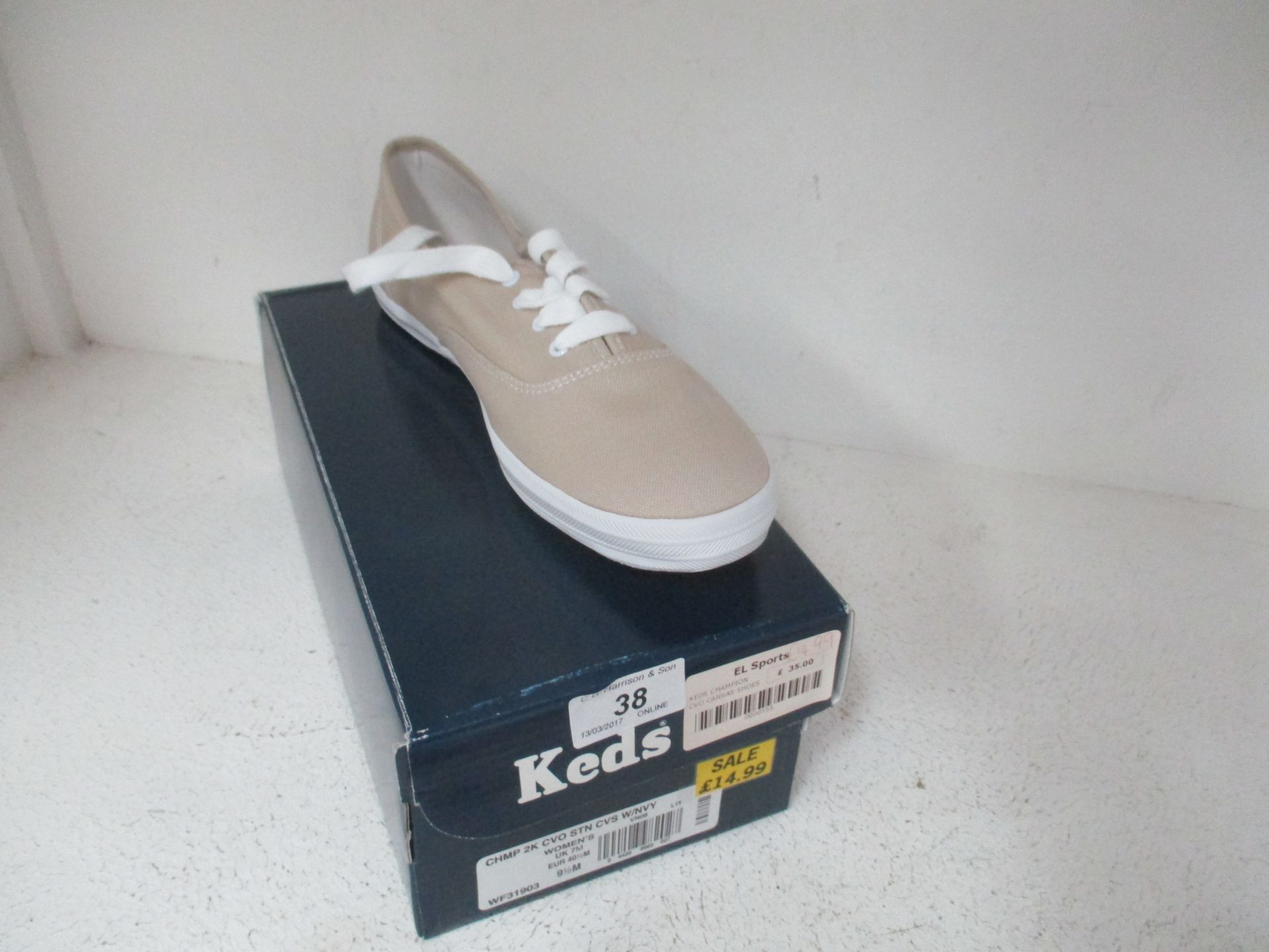 A pair of Keds Champion ladies canvas shoes in beige size UK 7