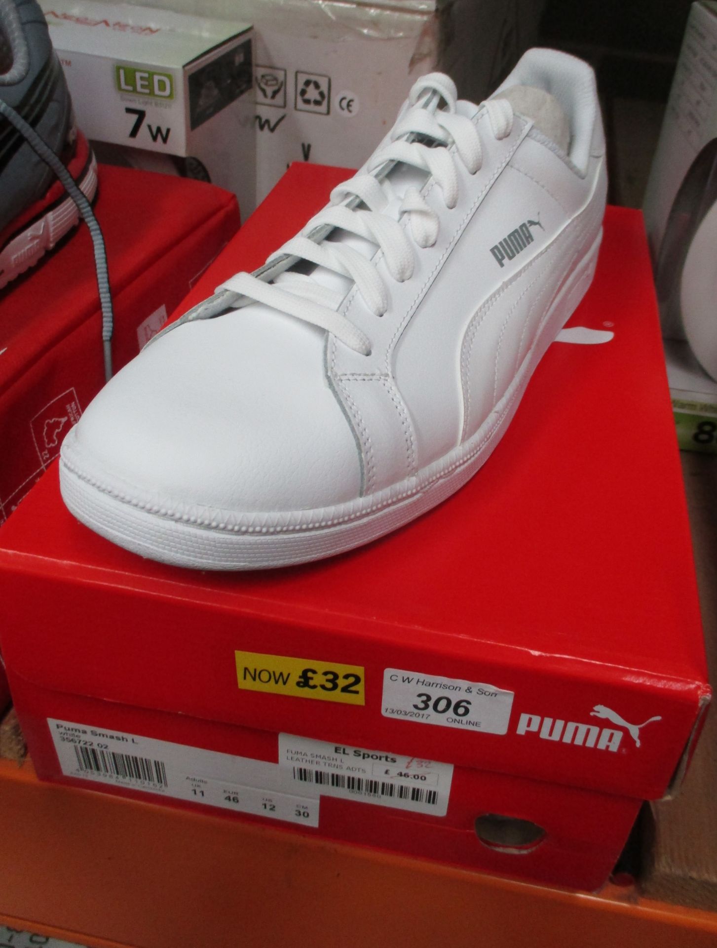 A pair of Puma Smash white leather trainers size 11