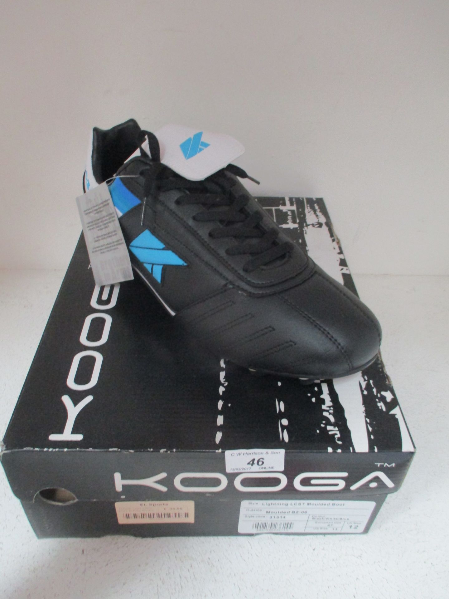 A pair of Kooga lighting LCST moulded B2-06 rugby boots size 12
