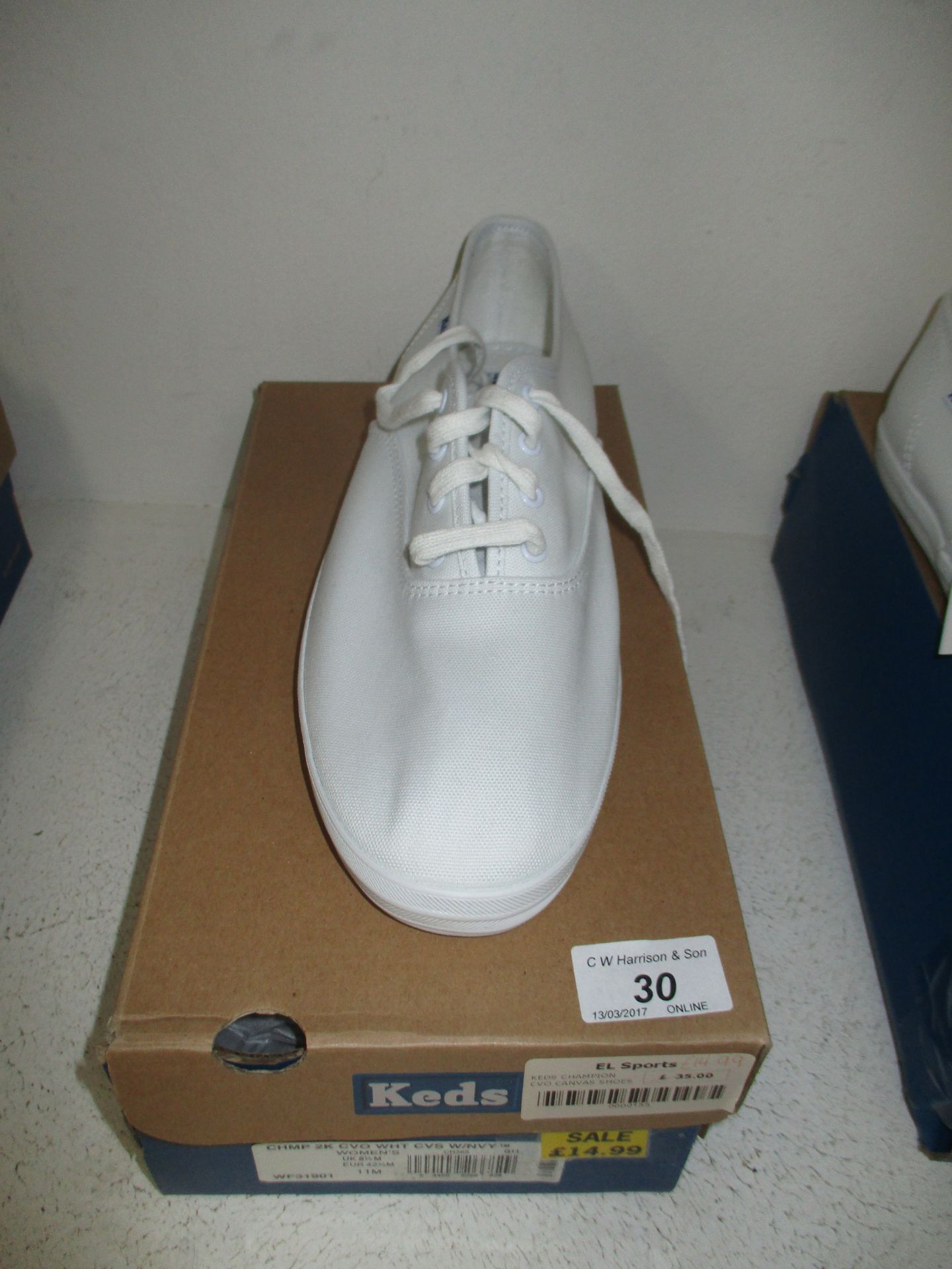A pair of Keds Champion CVO ladies canvas shoes in white size UK 8 1/2