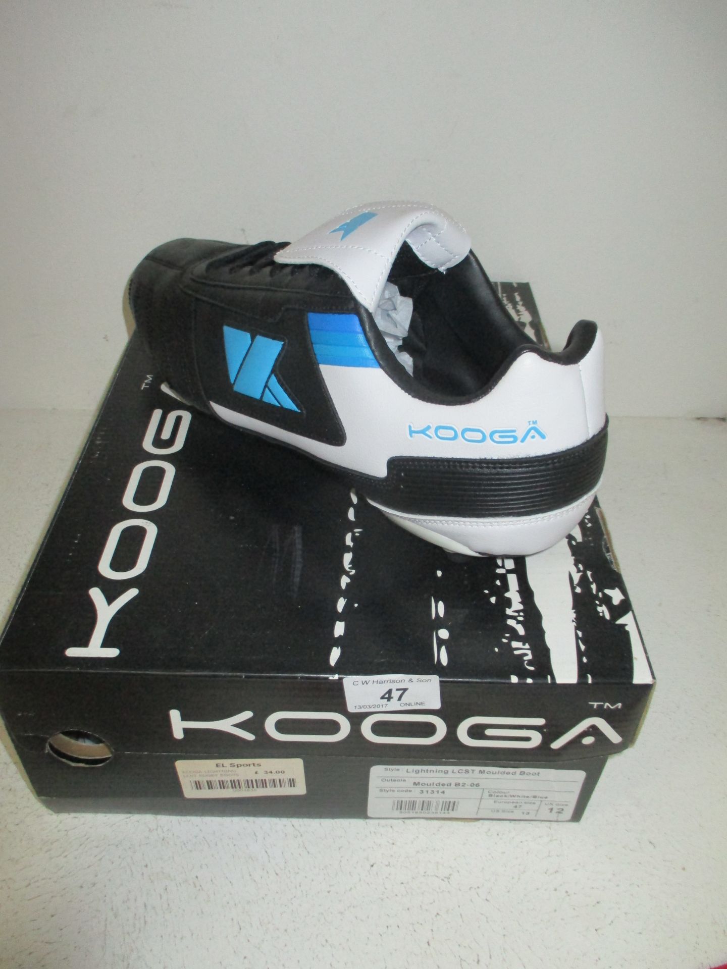 A pair of Kooga lighting LCST moulded B2-06 rugby boots size 12