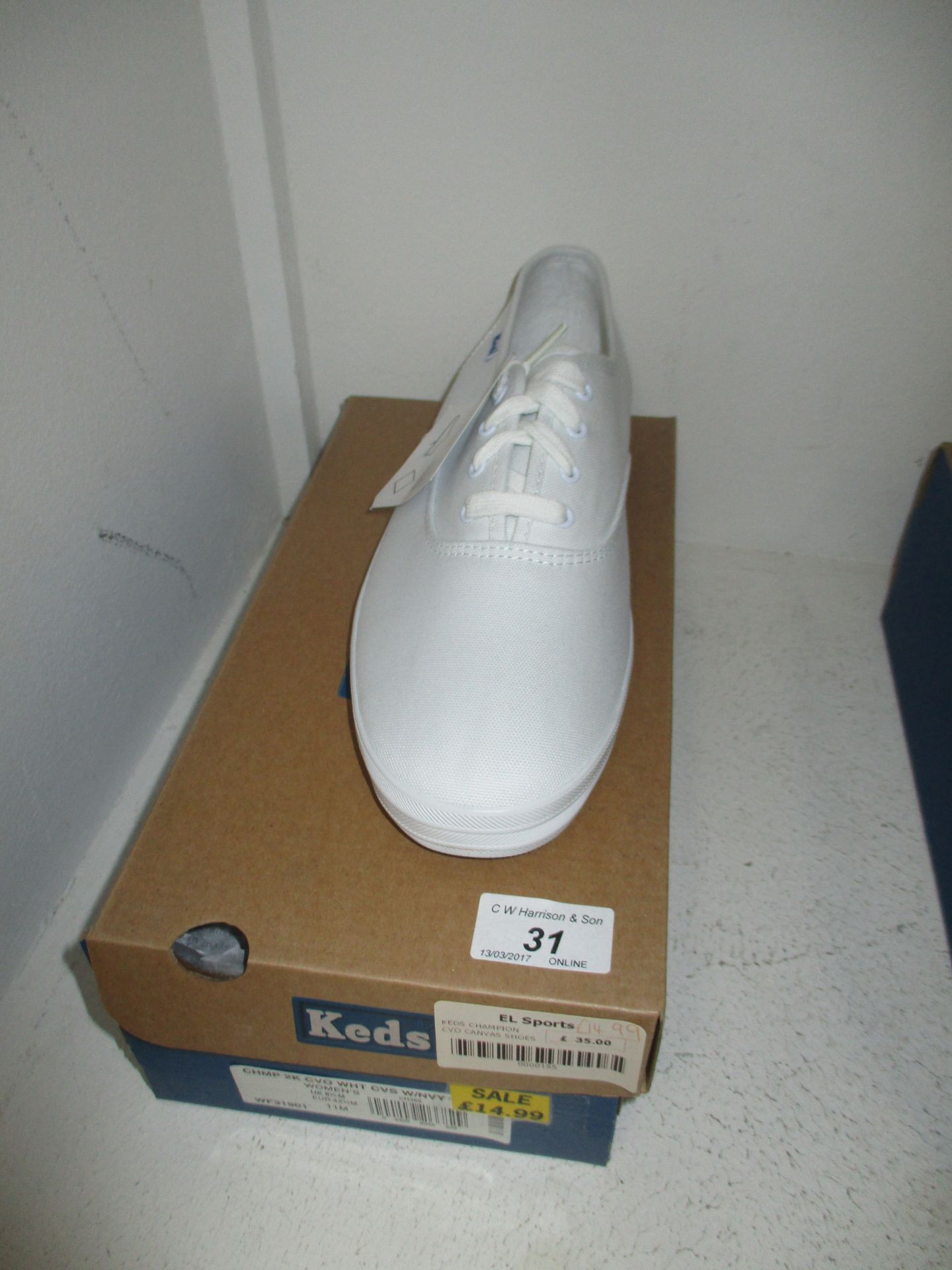 A pair of Keds Champion CVO ladies canvas shoes in white size UK 8 1/2