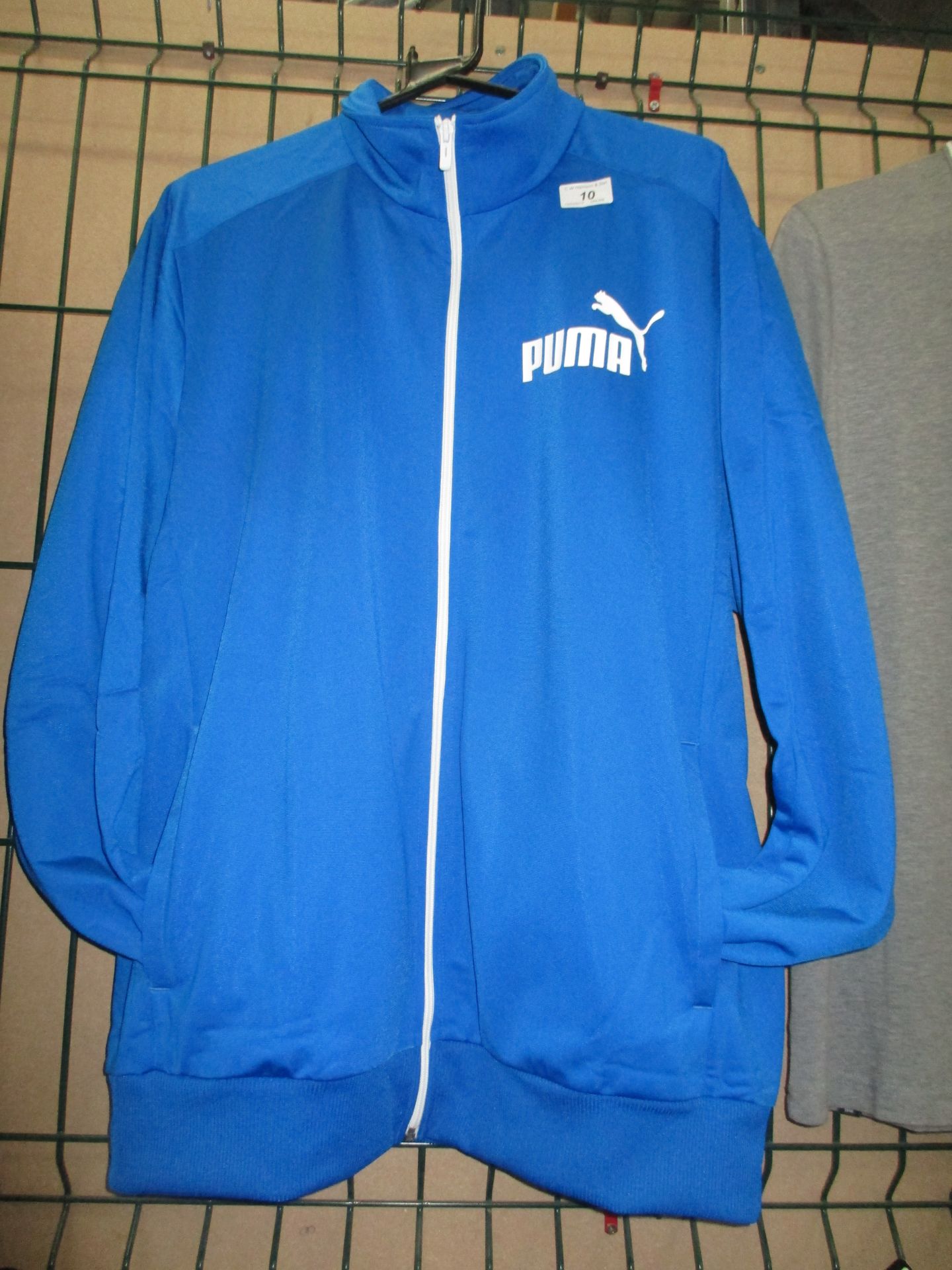 A Puma ESS royal blue polly jacket size XL